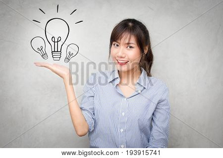 Young Asian Women Showhand For Present Something With Happy Emotion With Light Bulbs Icon.