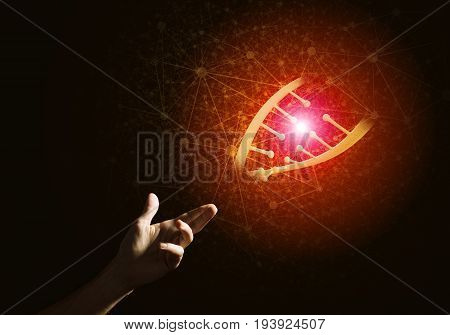 Close of man hand presenting DNA molecule research as concept. Mixed media