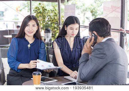 Beautiful Asian Woman Working With Team For Outdoor Business Discussion Business Discussion Concept.