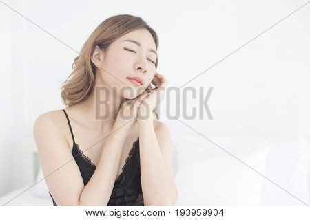 Beautiful Young Asian Woman Waking Up On The Bed, Woman Sexy In Bedroom Concept, 20S Year Old.