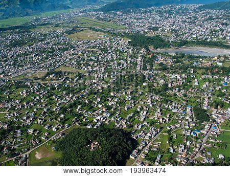 POKHARA, NEPAL. Flight on a hang glider (deltaplan). Shooting Pokhara 
 from the height of bird flight.