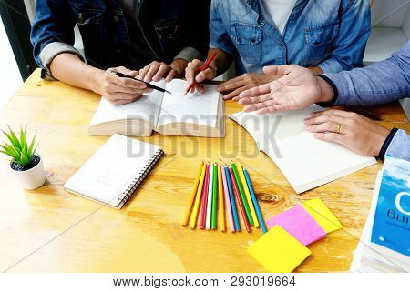 Woman And Man Work On The Table