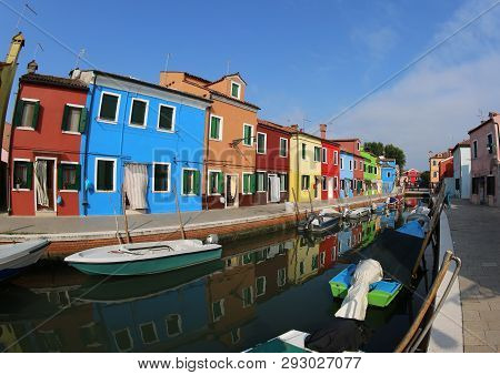 Houses Of Burano An Island In The Venetian Lagoon Near Venice In Northern Italy And The Waterway Wit