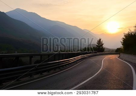 Sunset On The Mountain Road Near Demonte, Province Of Cuneo, Italy