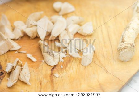 Horseradish Root Sliced On The Board. Top View
