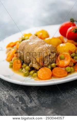 Beef meat stewed with potatoes-Traditional French cuisine Beef Bourguignon potatoes carrots in persillade