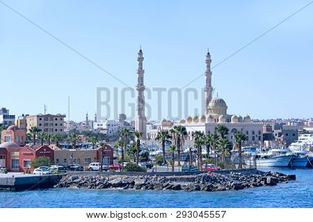 Hurghada / Egypt. 30 July 2018: 
View Of Embankment Of Hurghada With Moored Ships And Beautiful Mosq