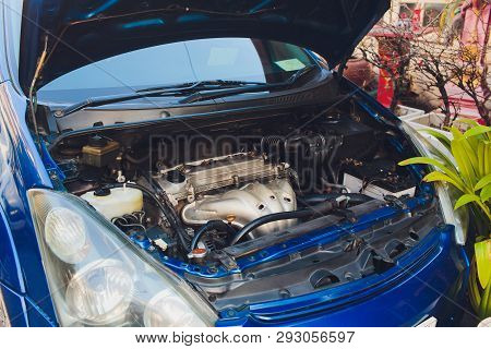 Car Crash Open Hood Car Mechanic To Check Condition Of Damage. See The Radiator Cooling Panel Engine