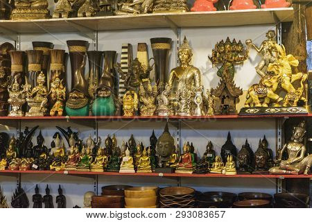 Various Thai Buddha Statuettes And Souvenirs For Sale In Local Bang Niang Night Market, Khao Lak, Th