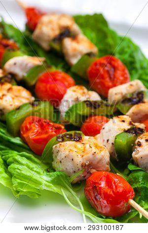 still life of meat skewers