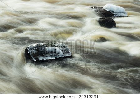 Long Exposure Photo. Rough River Jokelanjoki And Stones In Water, Kouvola, Finland.