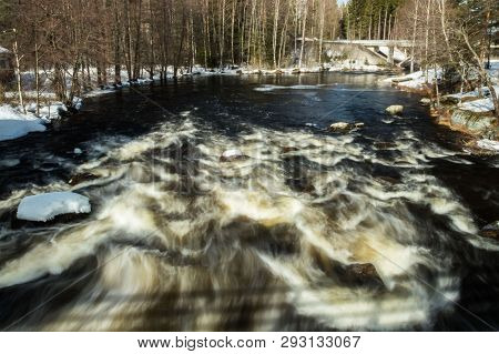Long Exposure Photo. Rough River Jokelanjoki And Stones In Water, Kouvola, Finland.