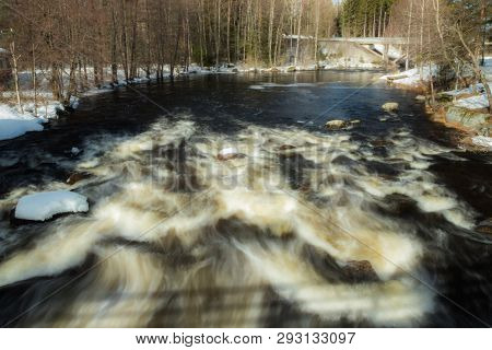 Long Exposure Photo. Rough River Jokelanjoki And Stones In Water, Kouvola, Finland.