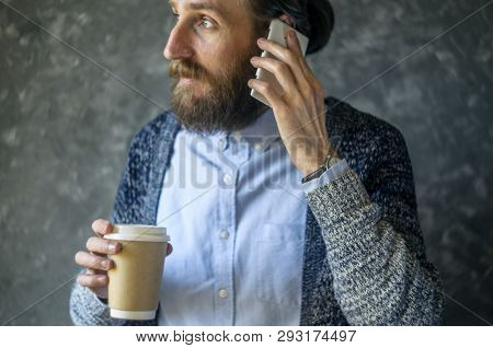 Happy Bearded Man Talk At Phone. Open And Friendly Communication With A Pleasant Interlocutor. Good 