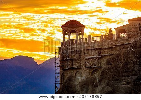 Scenic Sunset Evening Sky Over Holy Varlaam Monastery On Cliff In Meteora, Thessaly Greece. Greek De