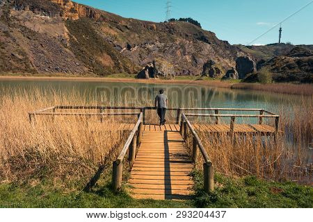 A Young Man Alone On A Lake, Portrait, La Arboleda, Basque Country
