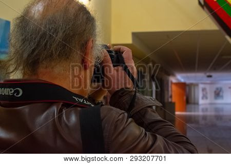Man Taking Photo By Cannon Camera Inside The Building Of Afyon Kocatepe University In The City Of  A