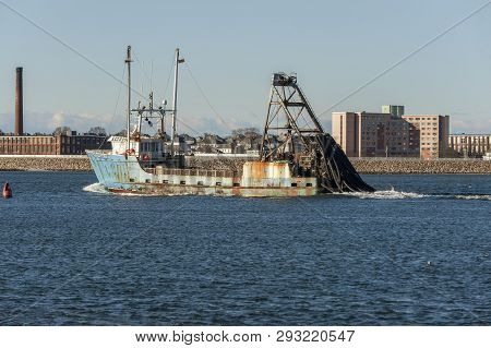 New Bedford, Massachusetts, Usa - March 17, 2019: Clammer Lady Brittany  On Acushnet River Passing T