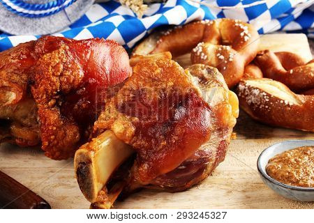 Traditional German Cuisine, Schweinshaxe Roasted Ham Hock And Pretzels