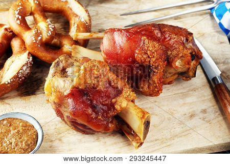 Traditional German Cuisine, Schweinshaxe Roasted Ham Hock And Pretzels