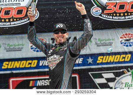 March 30, 2019 - Ft. Worth, Texas, USA: Kyle Busch (18) wins the My Bariatric Solutions 300 at Texas Motor Speedway in Ft. Worth, Texas.