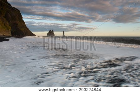 Reynisdrangar Are Basalt Sea Stacks Situated Under The Mountain Reynisfjall Near The Village Vik I M