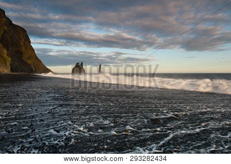 Sea Stacks And Basalt Clifs To The East Of Reynisfjara Black Sand Beach, Near Vik In Southern Icelan