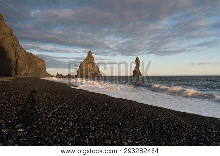 Sea Stacks And Basalt Clifs To The East Of Reynisfjara Black Sand Beach, Near Vik In Southern Icelan