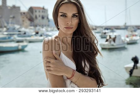 Portrait Of Brunette Woman With Long Hair
