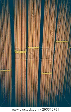 Large Rectanguler Wood Panels Stacked Up Together In Display