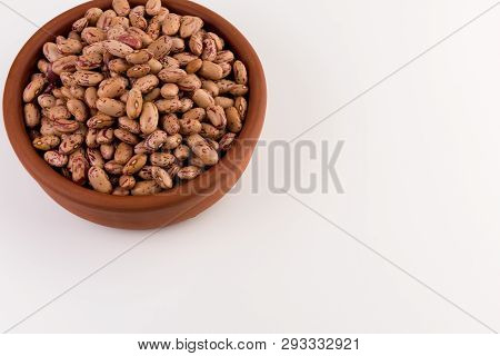 A Plate Of Beans On White Background