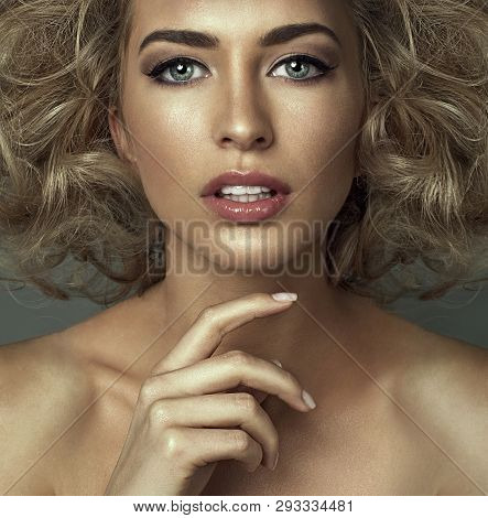 Portrait Of Blond Woman With Beautiful Eyes