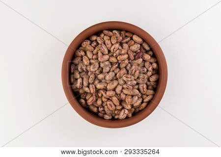 A Plate Of Beans On White Background