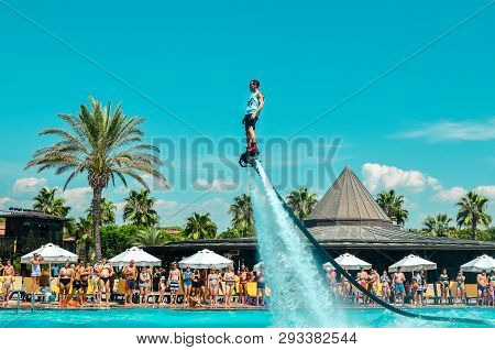 Belek, Turkey - September 12, 2018. Exciting Fly Board Watershow At The Pool Party On A Sunny Summer