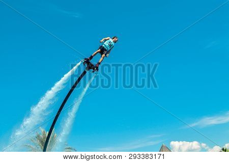 Belek, Turkey - September 12, 2018. Exciting Fly Board Watershow On A Sunny Summer Day. A Man Is Doi