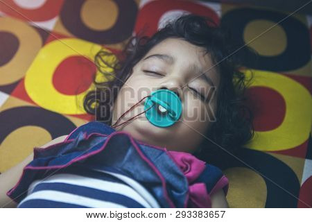 Closeup Of An Indian Toddler Baby Sleeping. Closeup Of An Asian Indian Infant Baby Sleeping