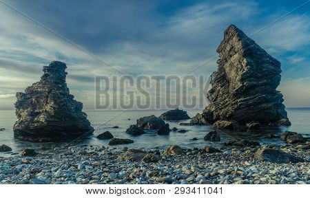 Nerja, Malaga, Andalusi, Spain - February 4, 2019: Molino Beach, Small Stone Beach With Two Large Ro