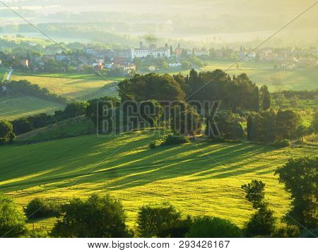 Background Of Beautiful Landscape In Green Fields And Blue Sky At Umbria, Italy Or Little Toscane Or