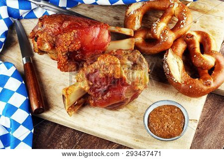 Traditional German Cuisine, Schweinshaxe Roasted Ham Hock And Pretzels