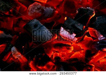 Burning Firewood In The Fireplace Close Up, Bbq Fire, Charcoal Background. Charcoal Fire With Sparks