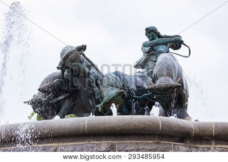 Copenhagen, Denmark - June 2016: Gefion Fountain, Copenhagen, Denmark. Statue Of Man Riding Bulls By