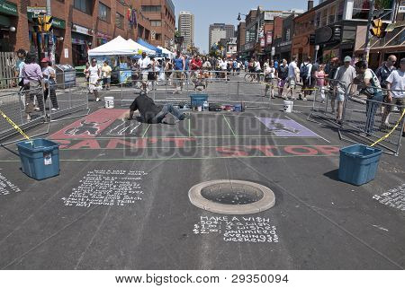 Street Artist Painting The Road At The Toronto Gay Pride Festival