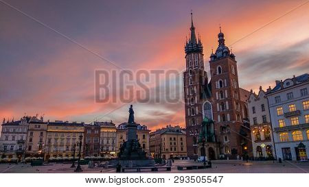Krakow, Poland - March 9, 2019: Romantic View Of Rynek Główny At Sunset In The Medieval Center Of Kr
