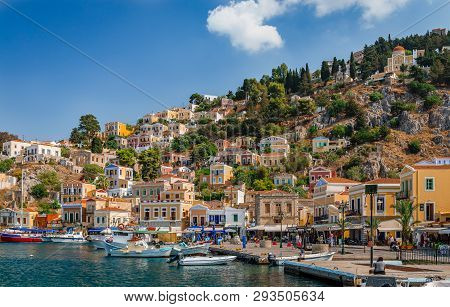 Symi / Greece - August 17 2017: View Of Yalos. Symi Is A Tiny Island Of Dodecanese, That Amazes Visi