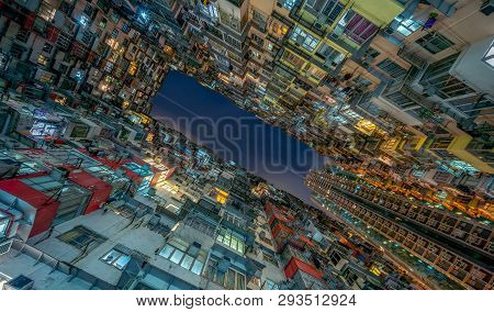 Yick Fat Building, Quarry Bay, Hong Kong. Residential Area In Old Apartment. High-rise Building, Sky
