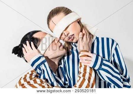 Couple Of Models Having Blindfolds And Lines On Faces
