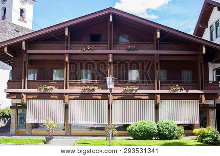An Old, Vintage, Wooden House In Austian City Lofer
