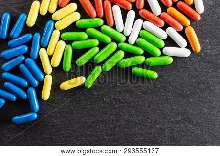 Lot Of Whole Sweet Licorice Comfit Copyspace Flatlay On Grey Stone