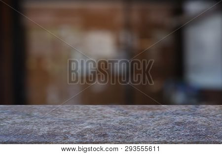 Empty Marblestone Table In Front Of Abstract Blurred Indoor House Room Interior Background. For Mont