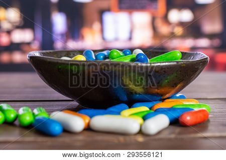 Lot Of Whole Sweet Licorice Comfit On Grey Ceramic Plate In A Restaurant